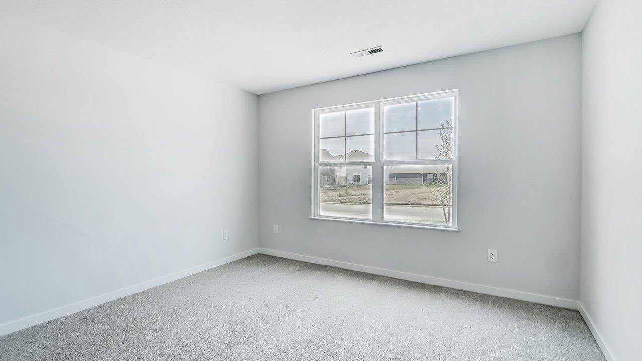 primary bedroom with double window