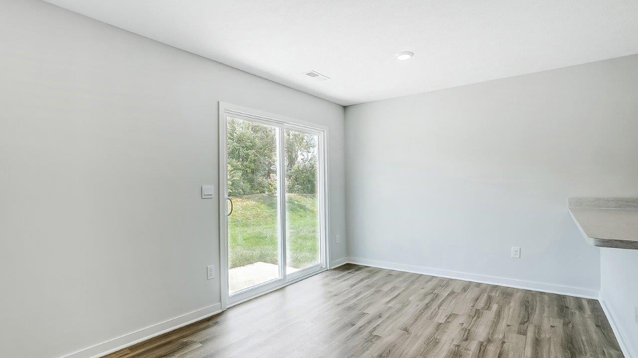 dining space with rear sliding door