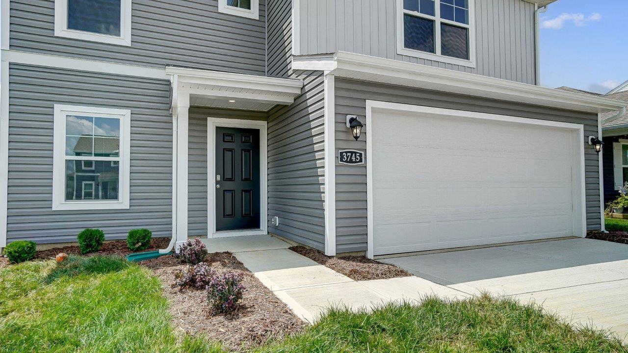 covered entry and two car garage