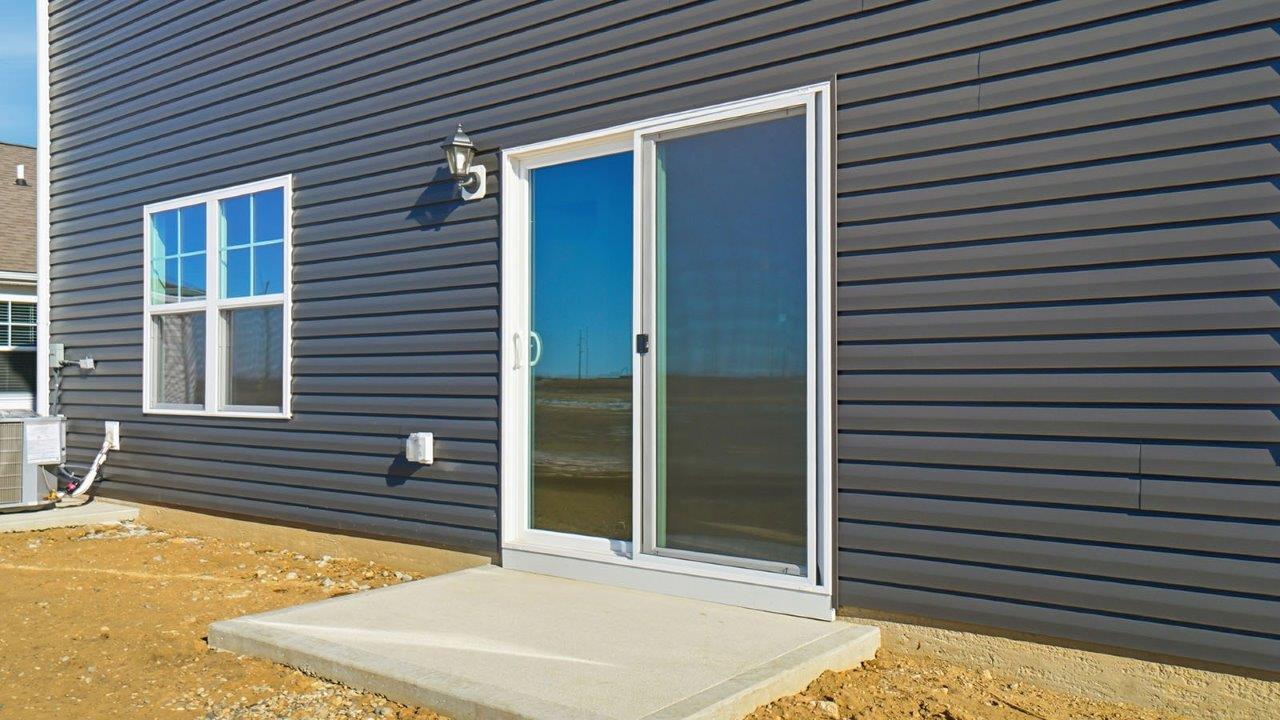 rear sliding door and concrete slab