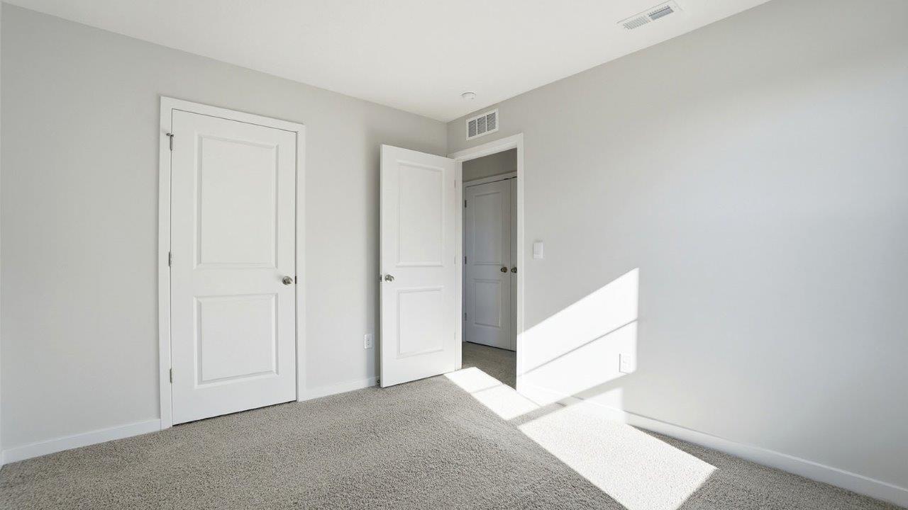 third bedroom closet and entry