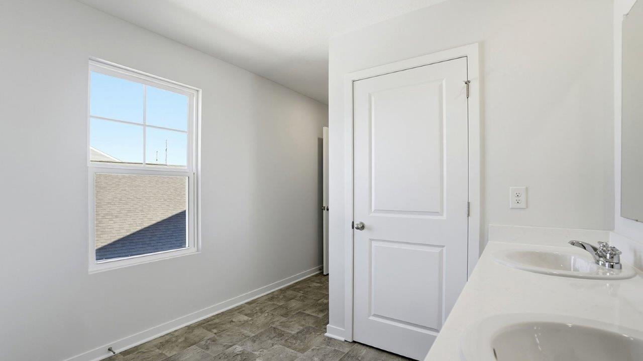 ensuite vanity, water closet and single window