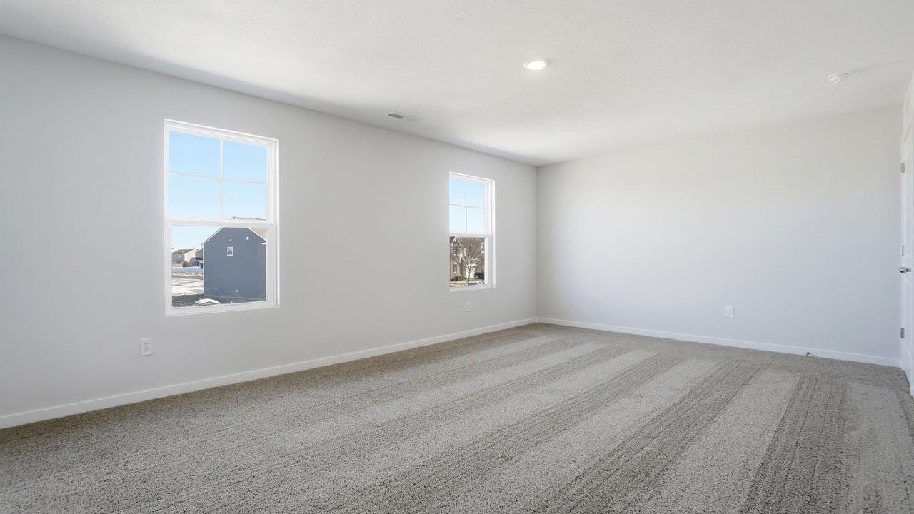 primary bedroom with single windows