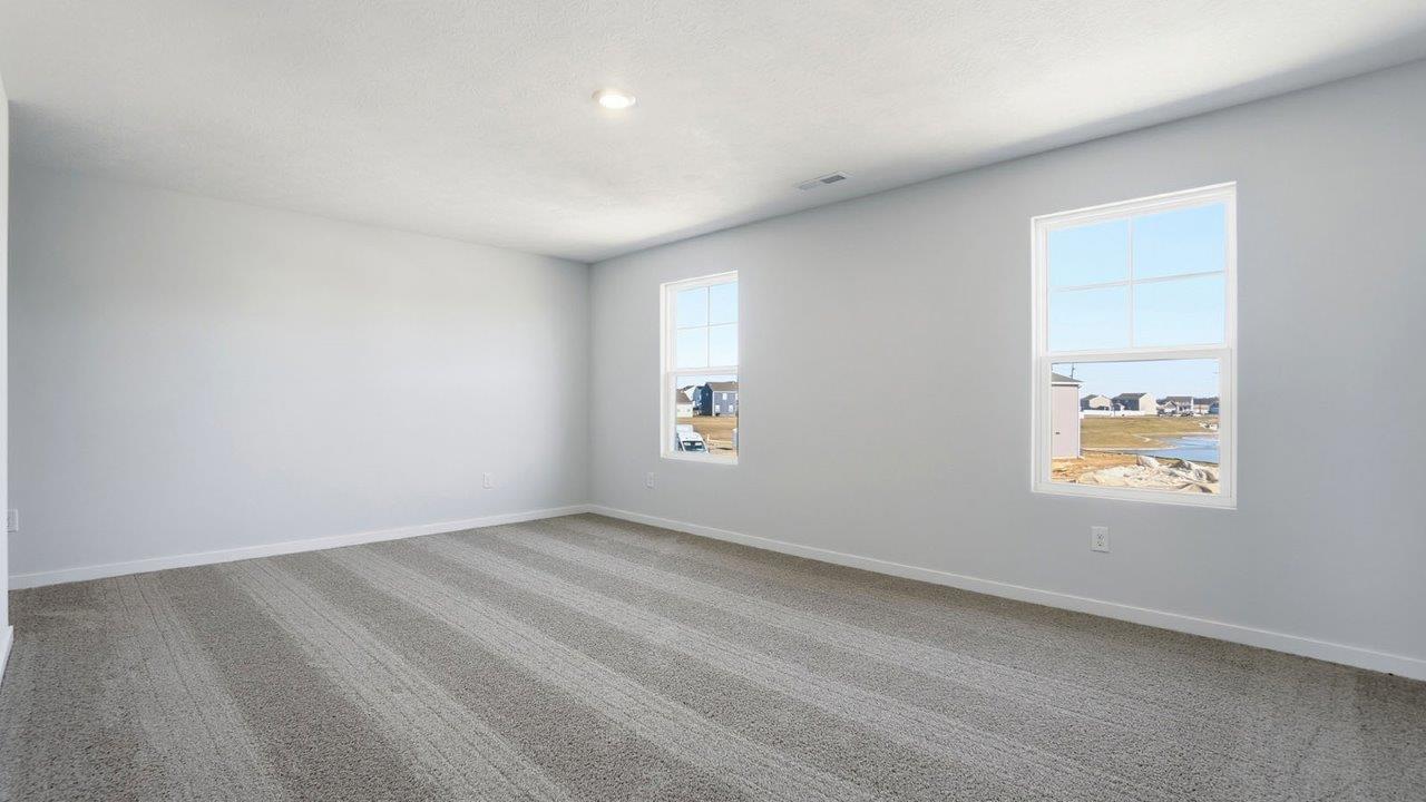 primary bedroom with single windows