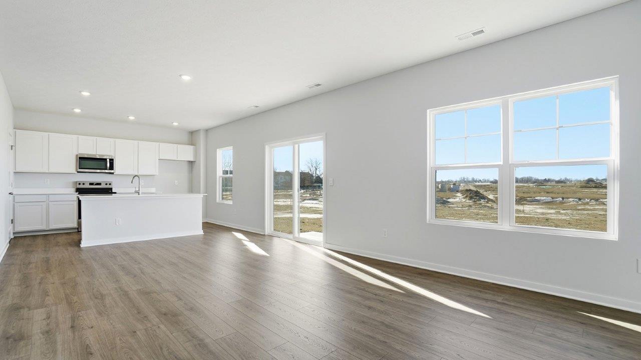 kitchen, dining with sliding door and great room