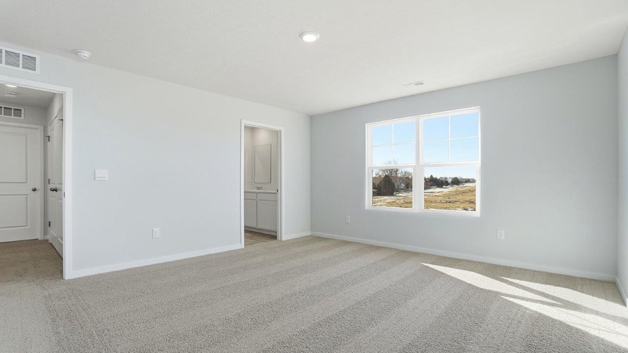 primary bedroom entry, ensuite bath and double window