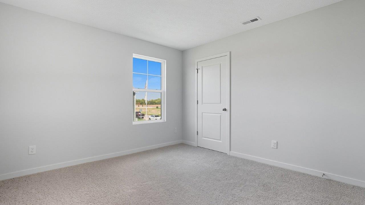 fourth bedroom with single window and closet