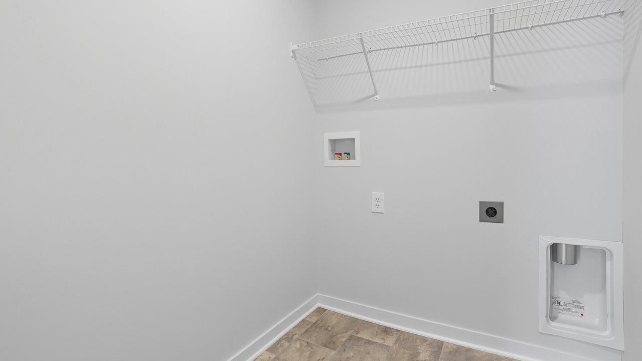 laundry room with wire shelving