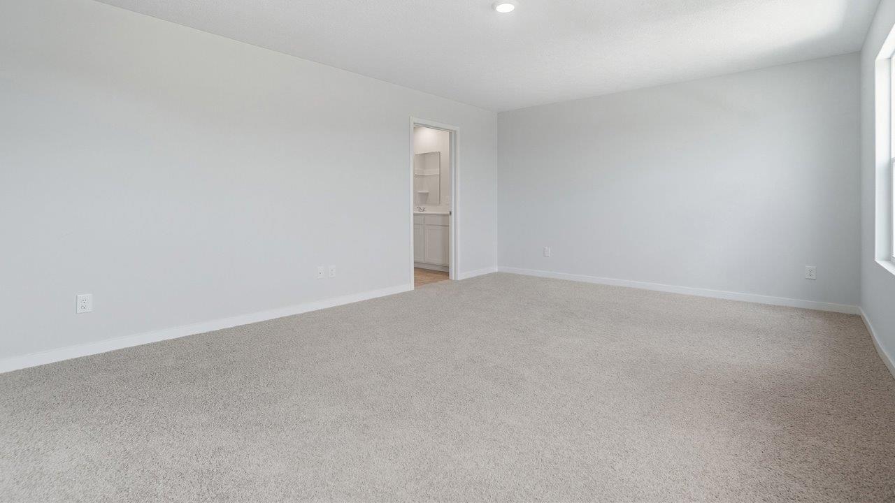 primary bedroom with ensuite bath