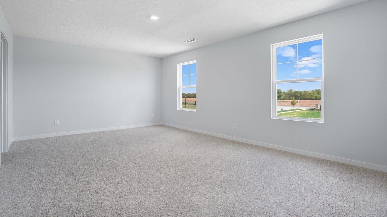 primary bedroom with single windows