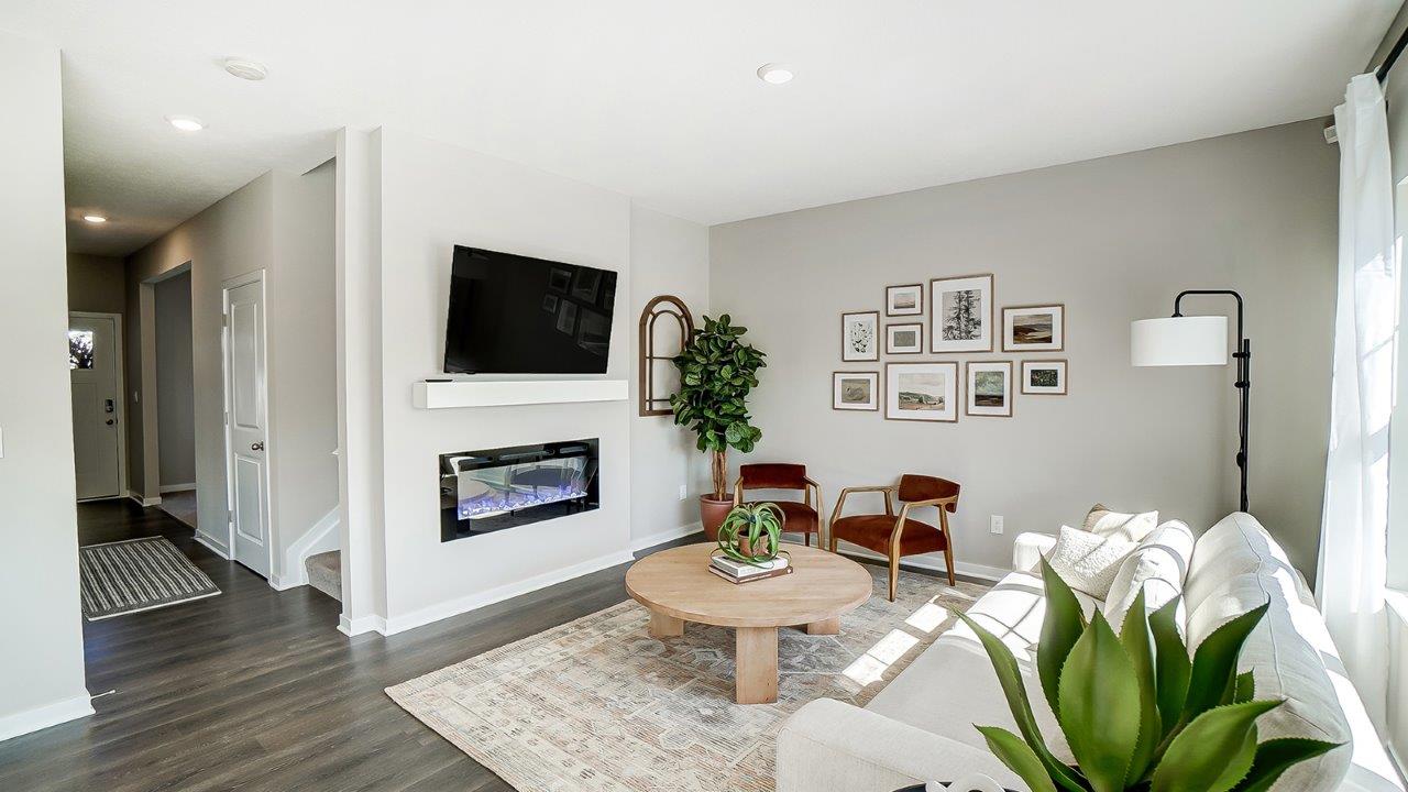 furnished great room with electric fireplace