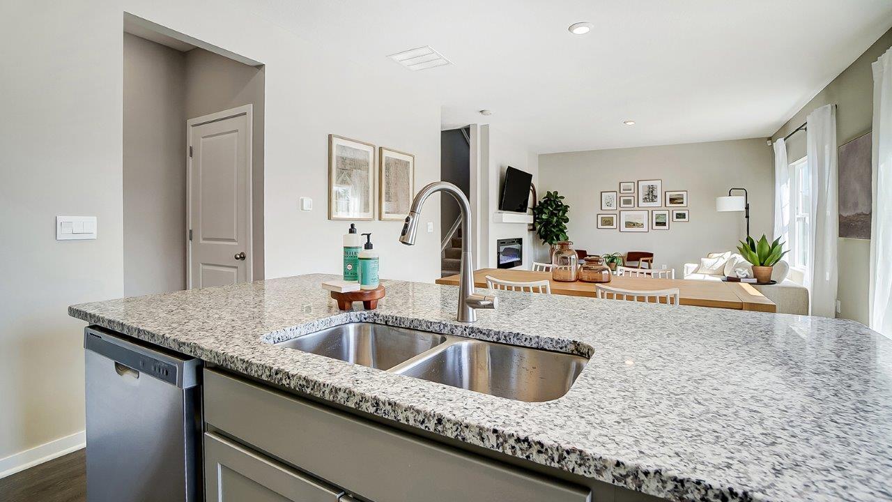 built in island with split sink and stainless steel faucet