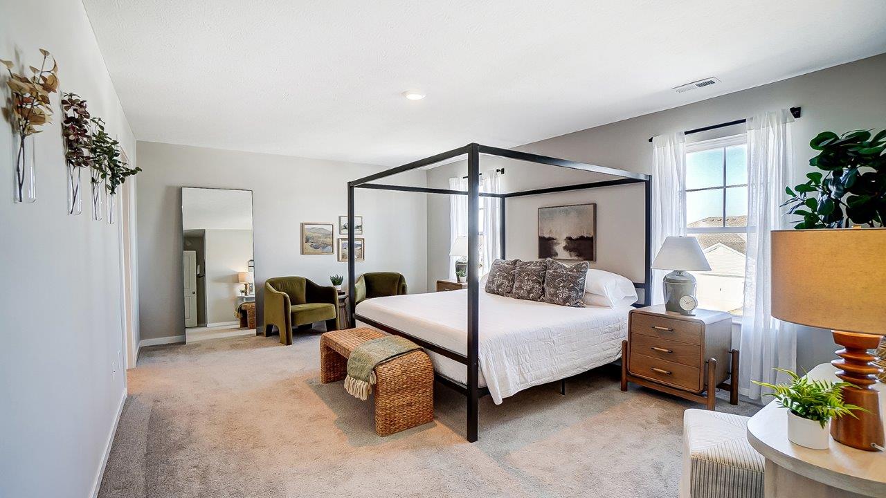 furnished primary bedroom