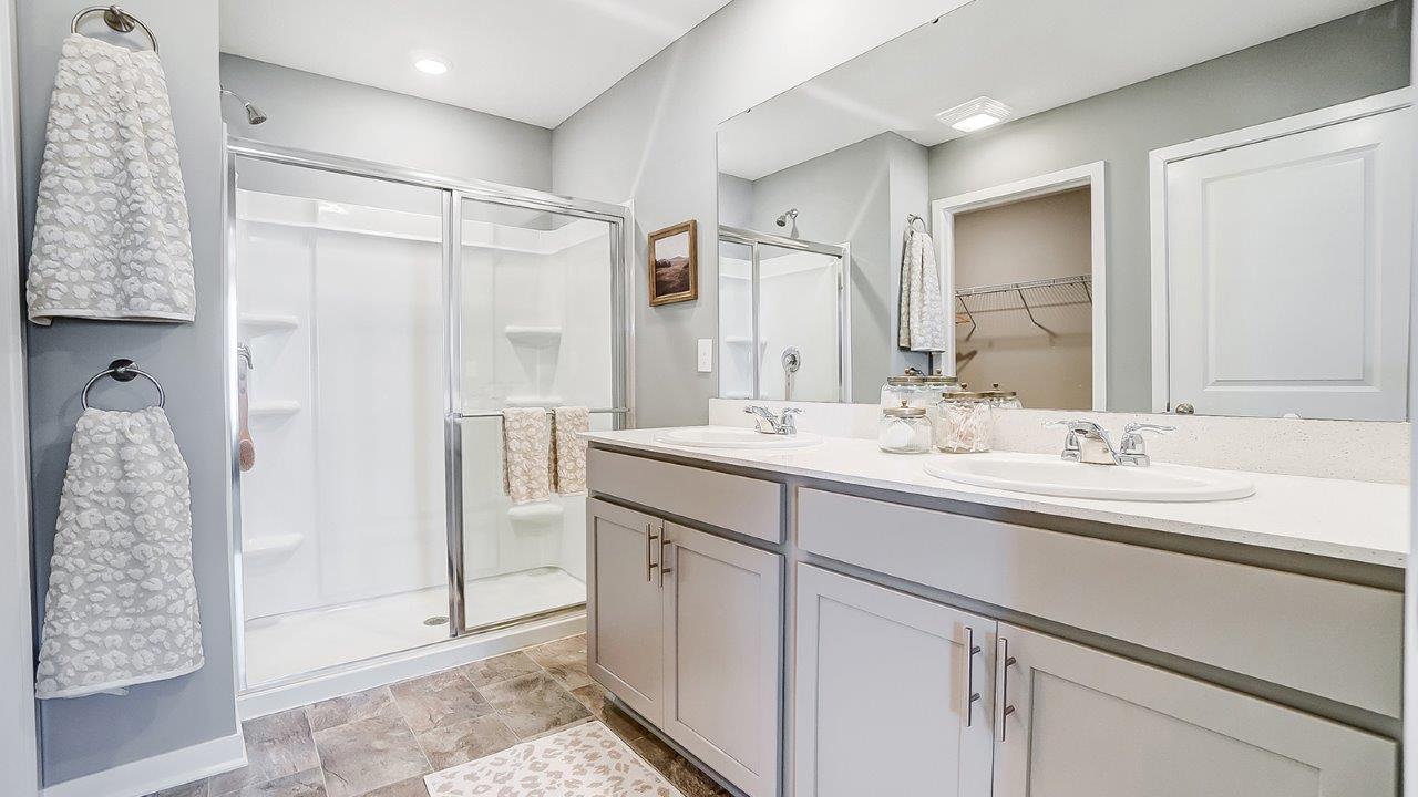 ensuite bath with double vanity and walk in shower