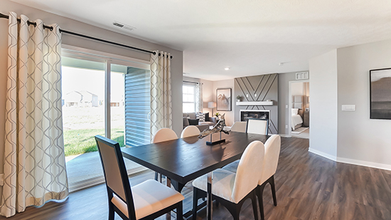 dining space, rear sliding door and great room