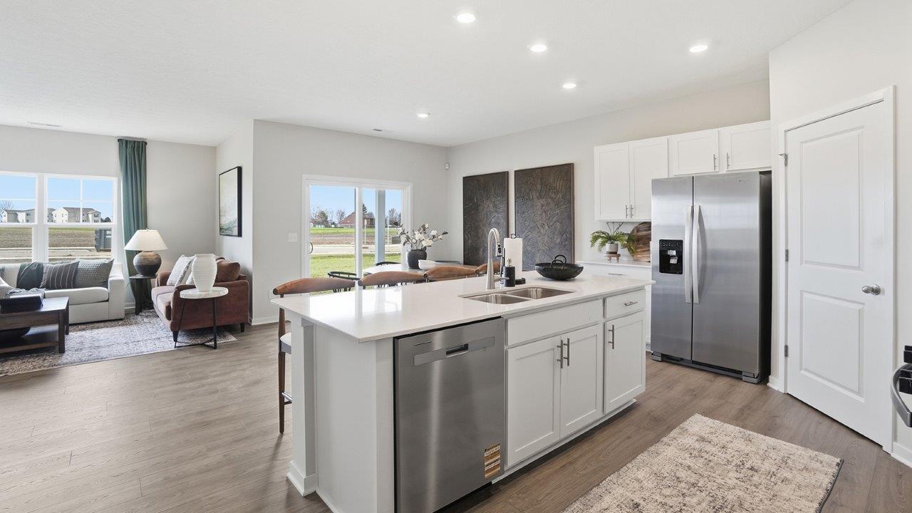 kitchen island and great room and dining