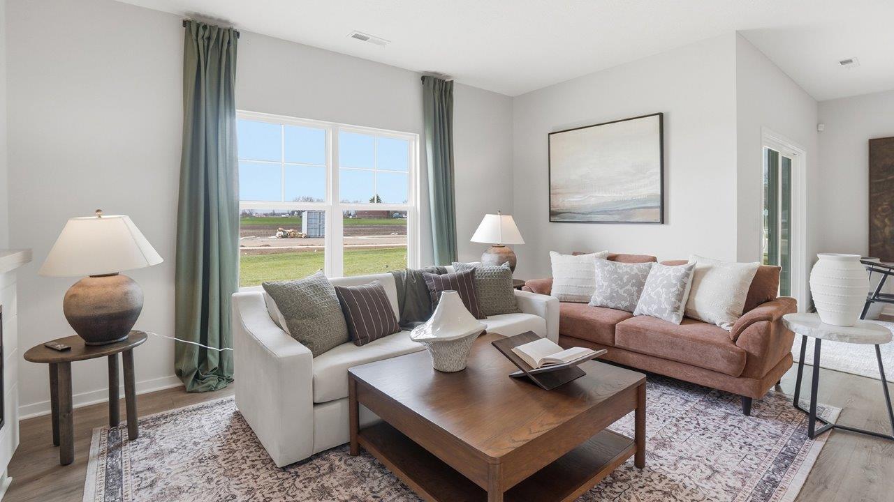 furnished great room with double window