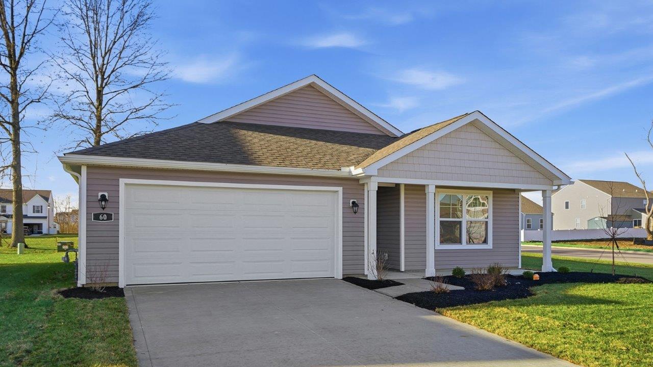 single story home with grey siding, covered front porch and two car garage