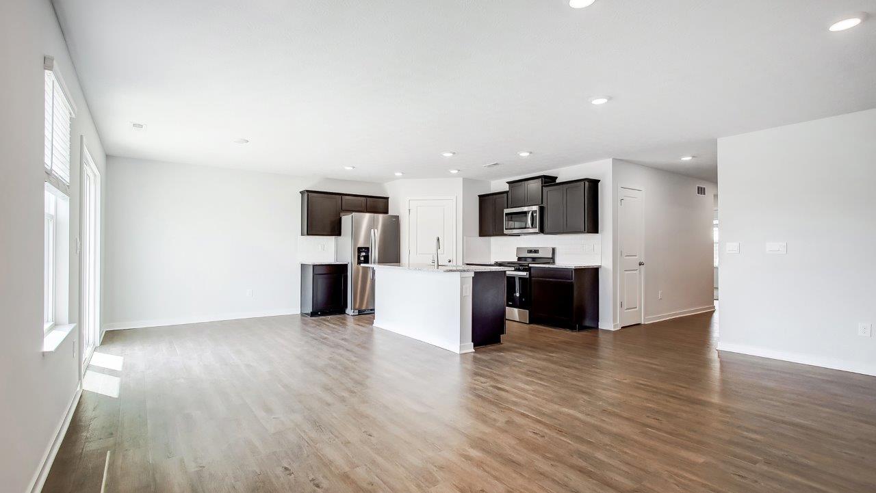 great room, dining and kitchen