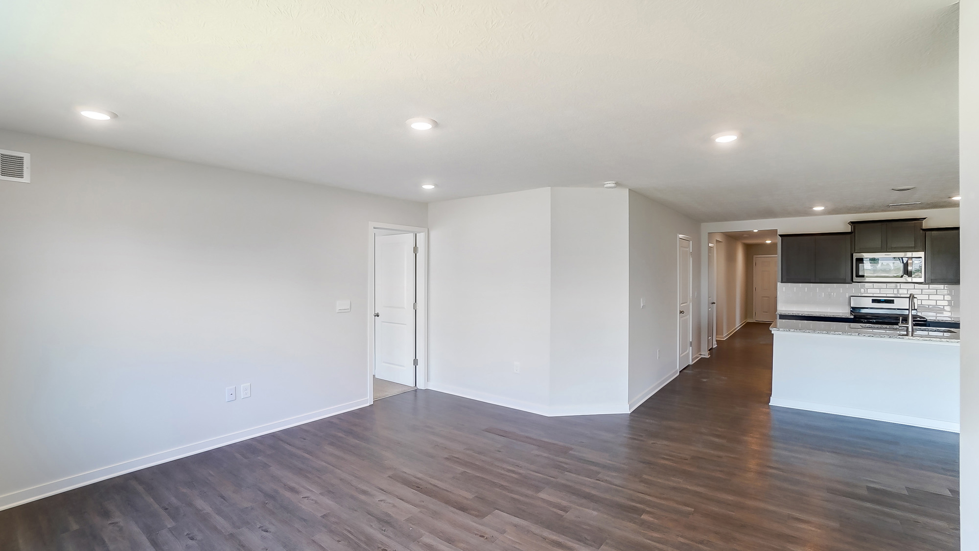 great room, foyer and kitchen