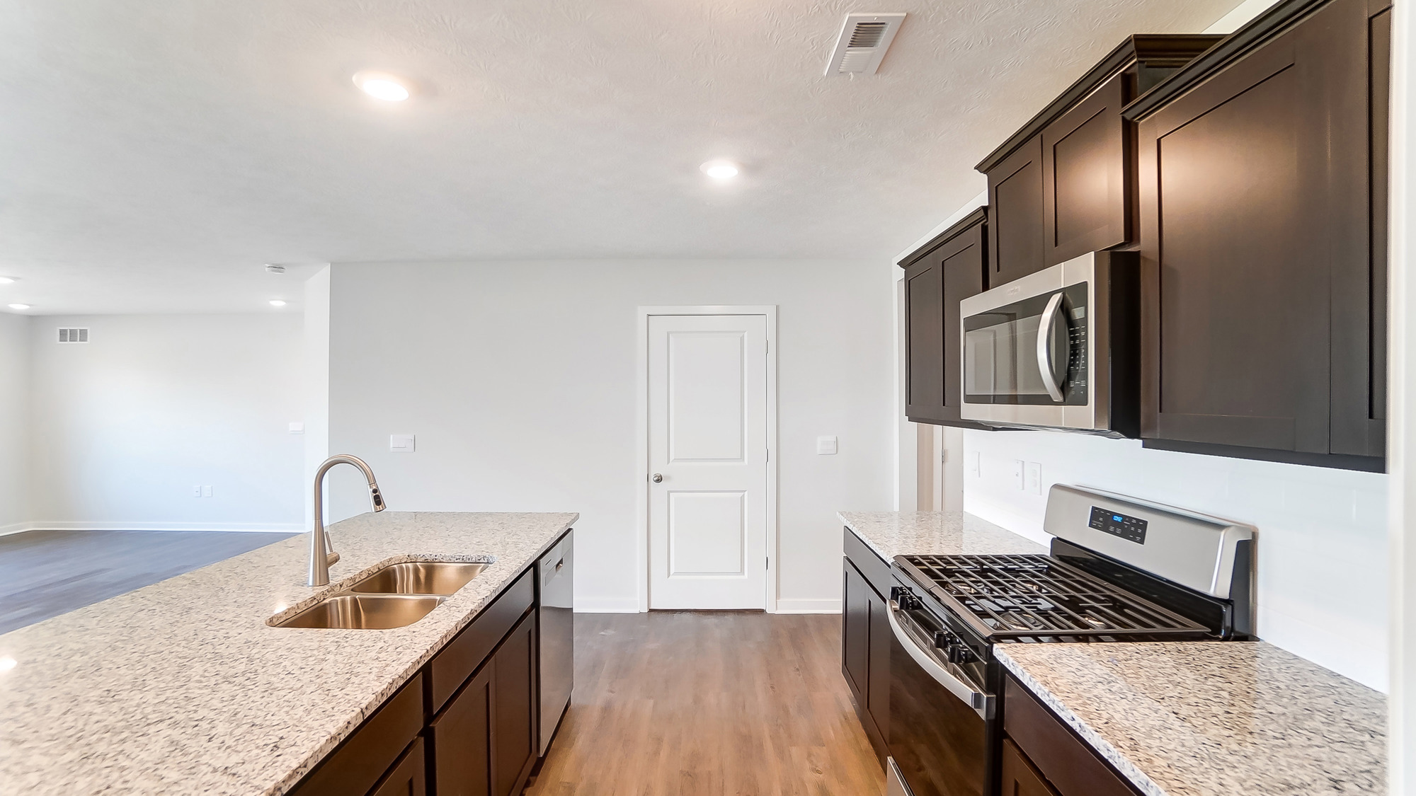 Chatham kitchen with brown stain cabinets