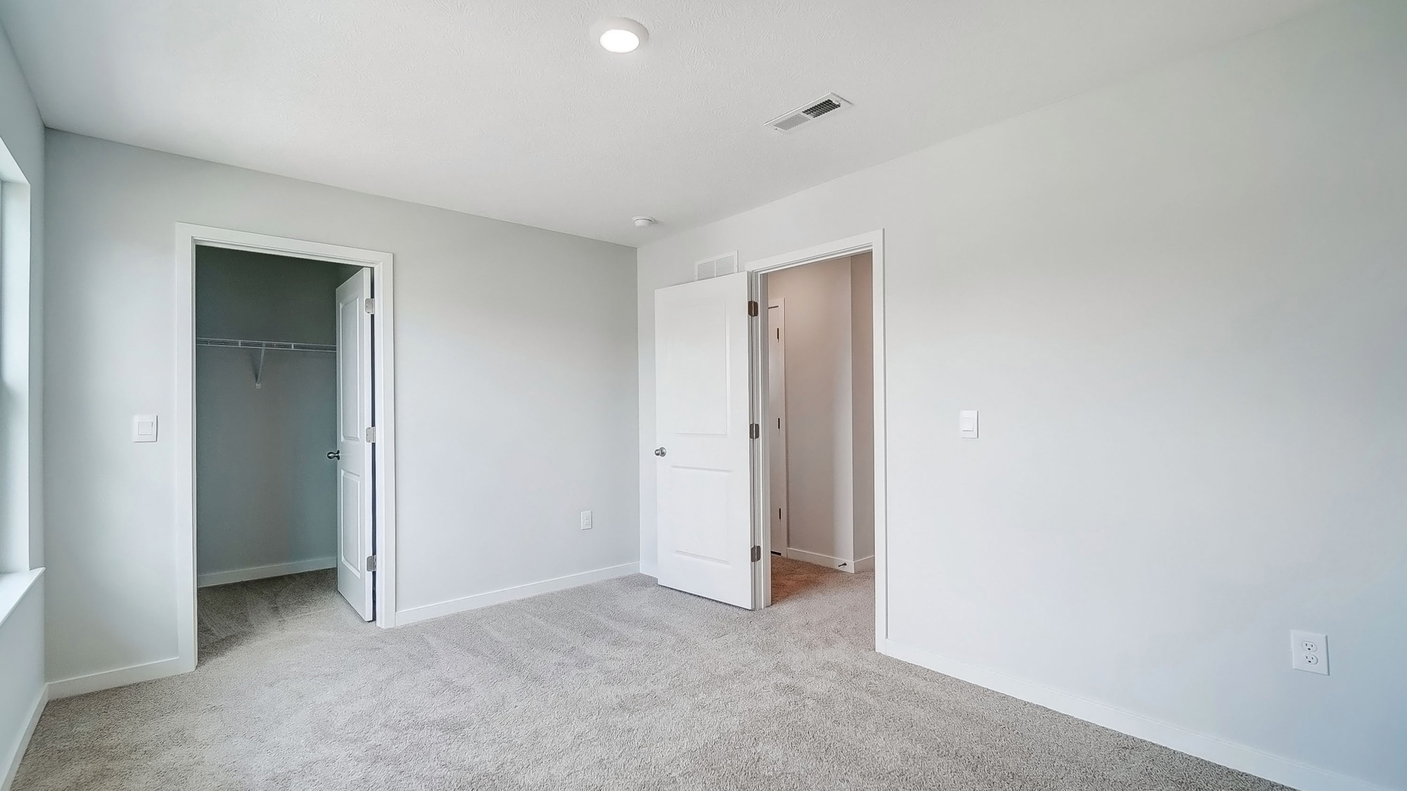 third bedroom closet and entry