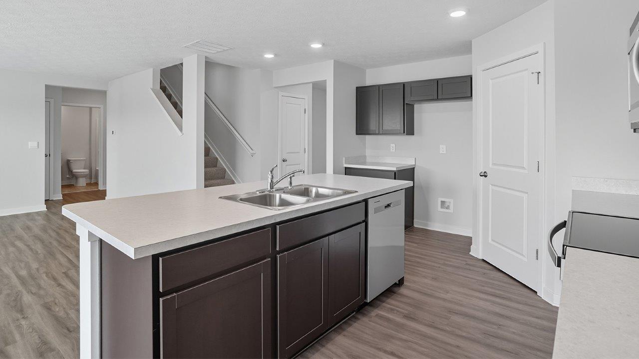 Henley kitchen with dark stain cabinets