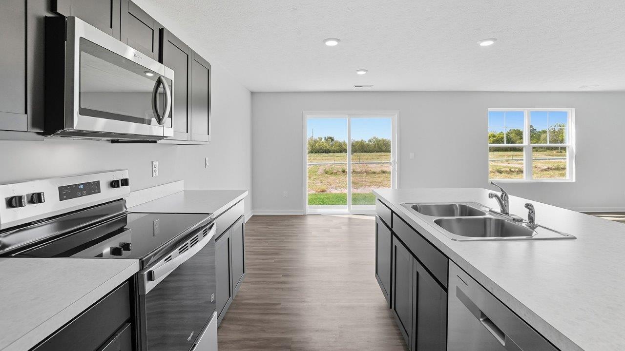 Henley kitchen with dark stain cabinets