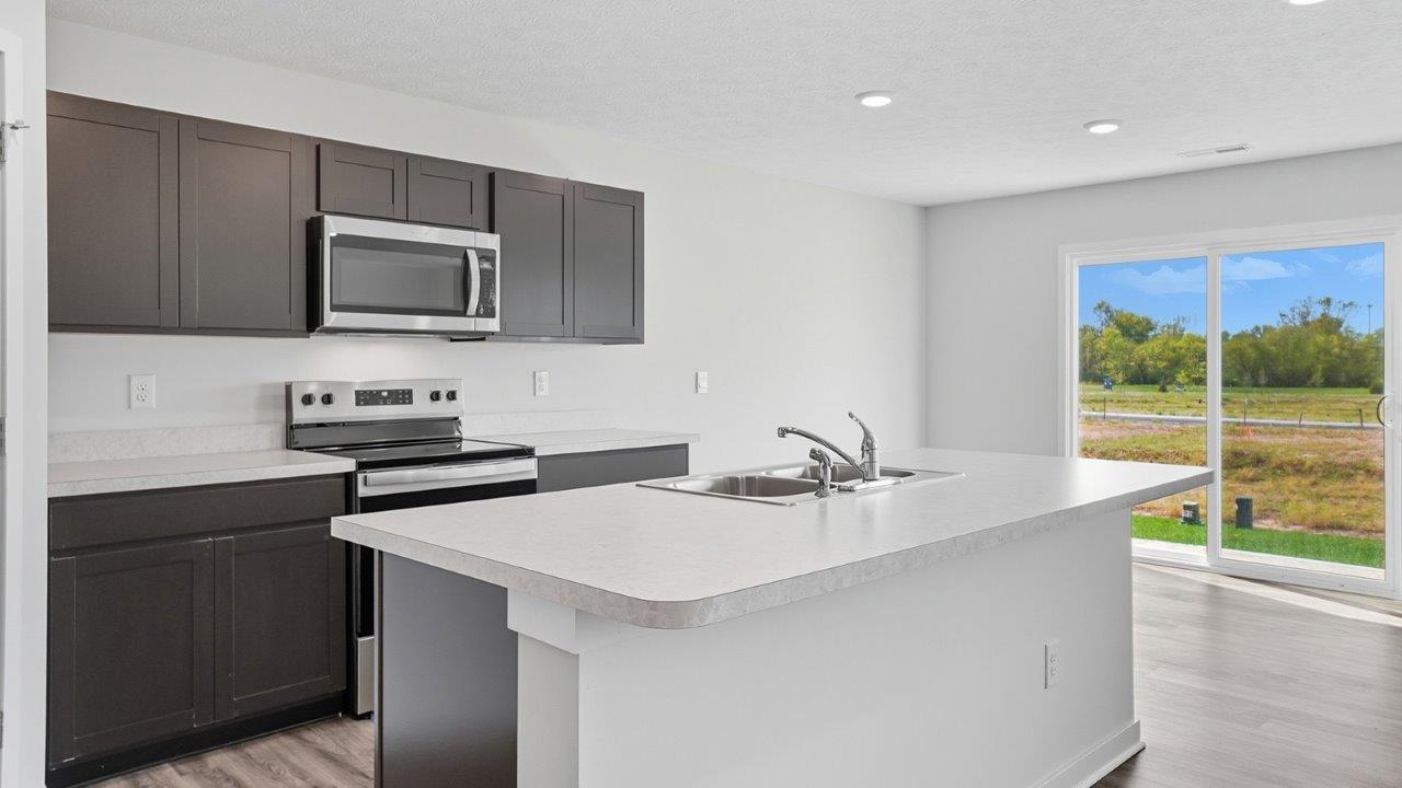 Henley kitchen with dark stain cabinets