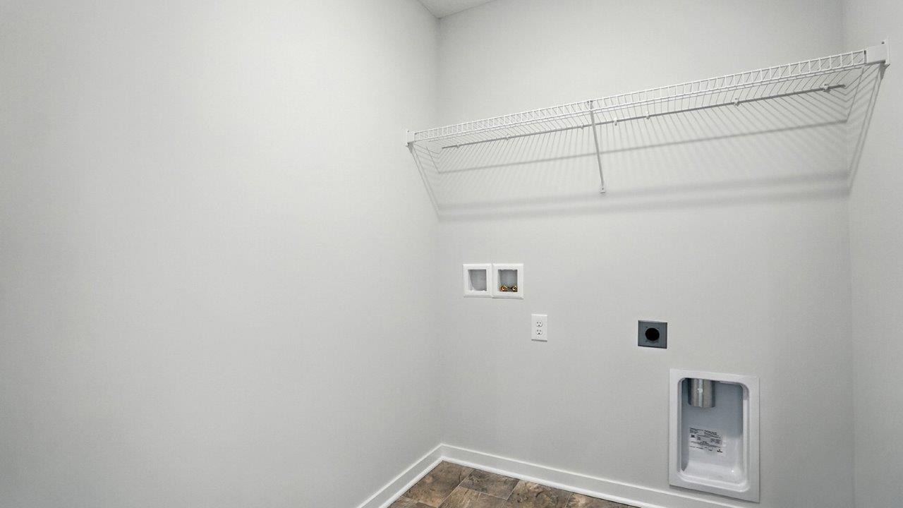 laundry room with wire shelving