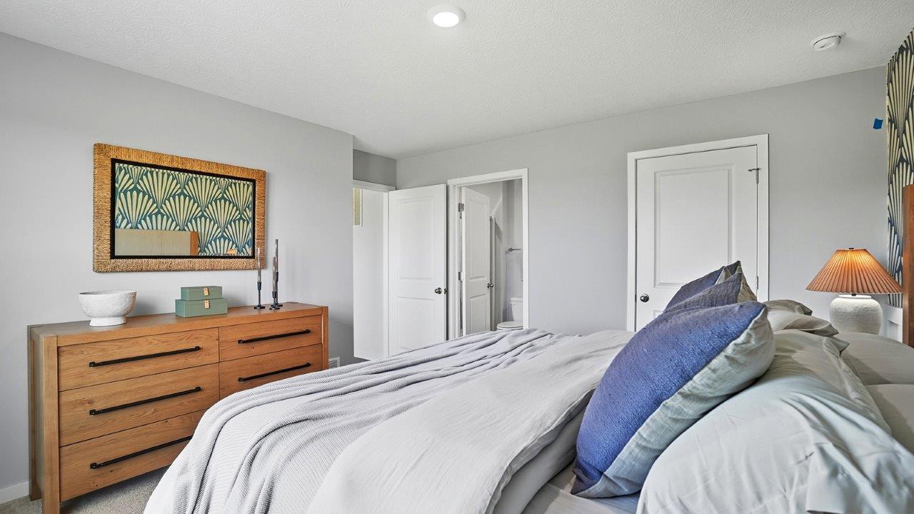 Freeport Bedroom 1 with graphic wallpaper