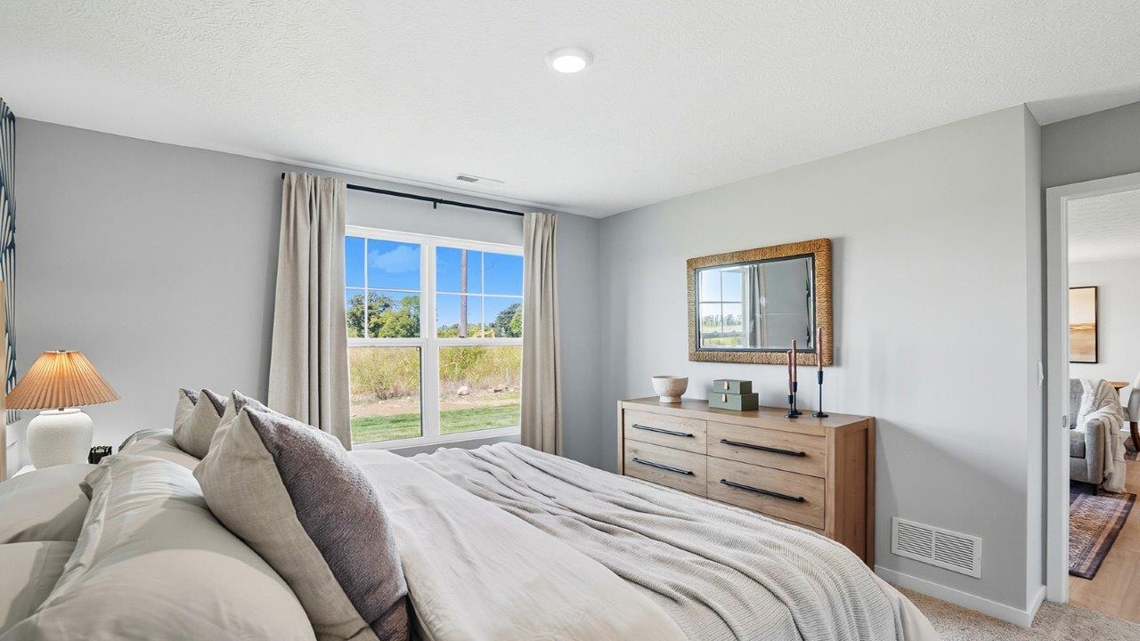 Freeport Bedroom 1 with graphic wallpaper