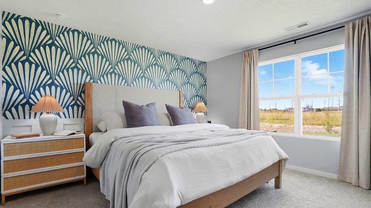 Freeport Bedroom 1 with graphic wallpaper