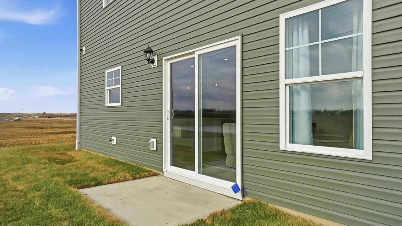 rear sliding door with concrete pad