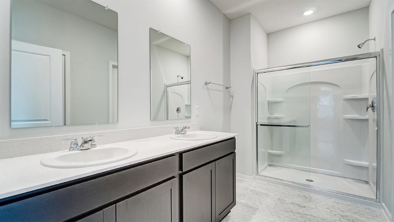 Newcastle Bathroom 1 with dark stain cabinets