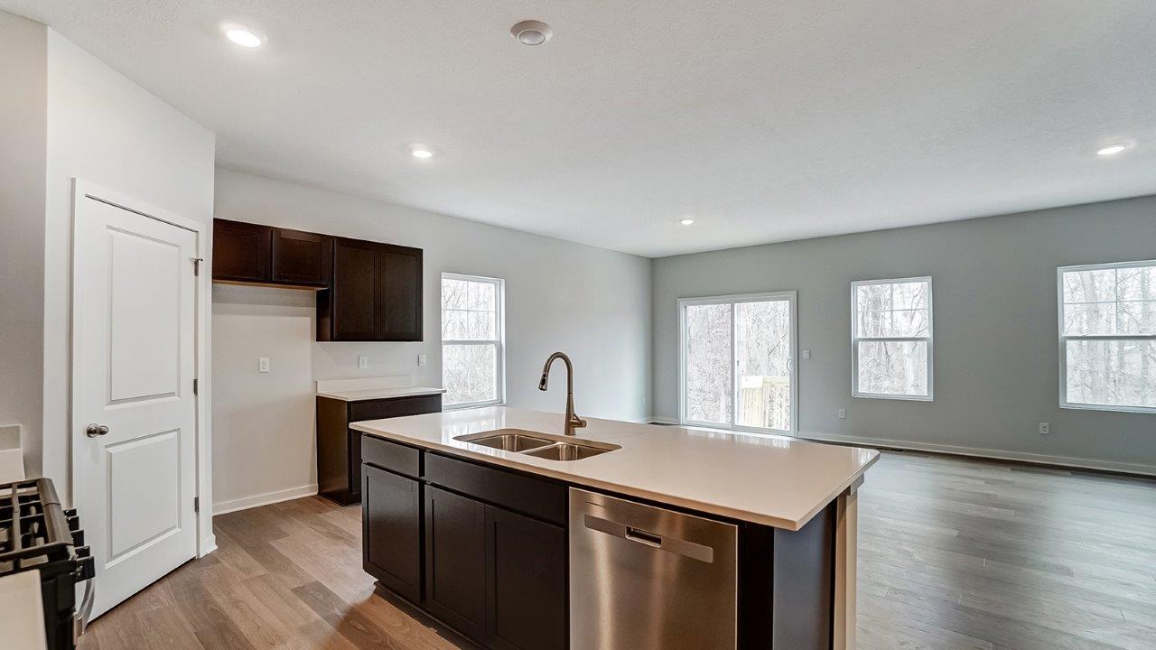 Newcastle kitchen with dark stain cabinets