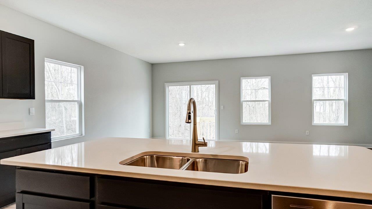 Newcastle kitchen with dark stain cabinets