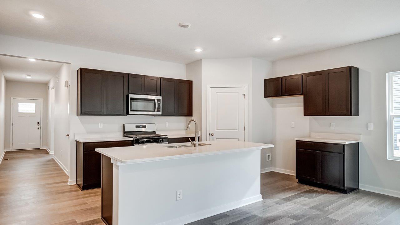 Newcastle Kitchen with dark stain cabinets