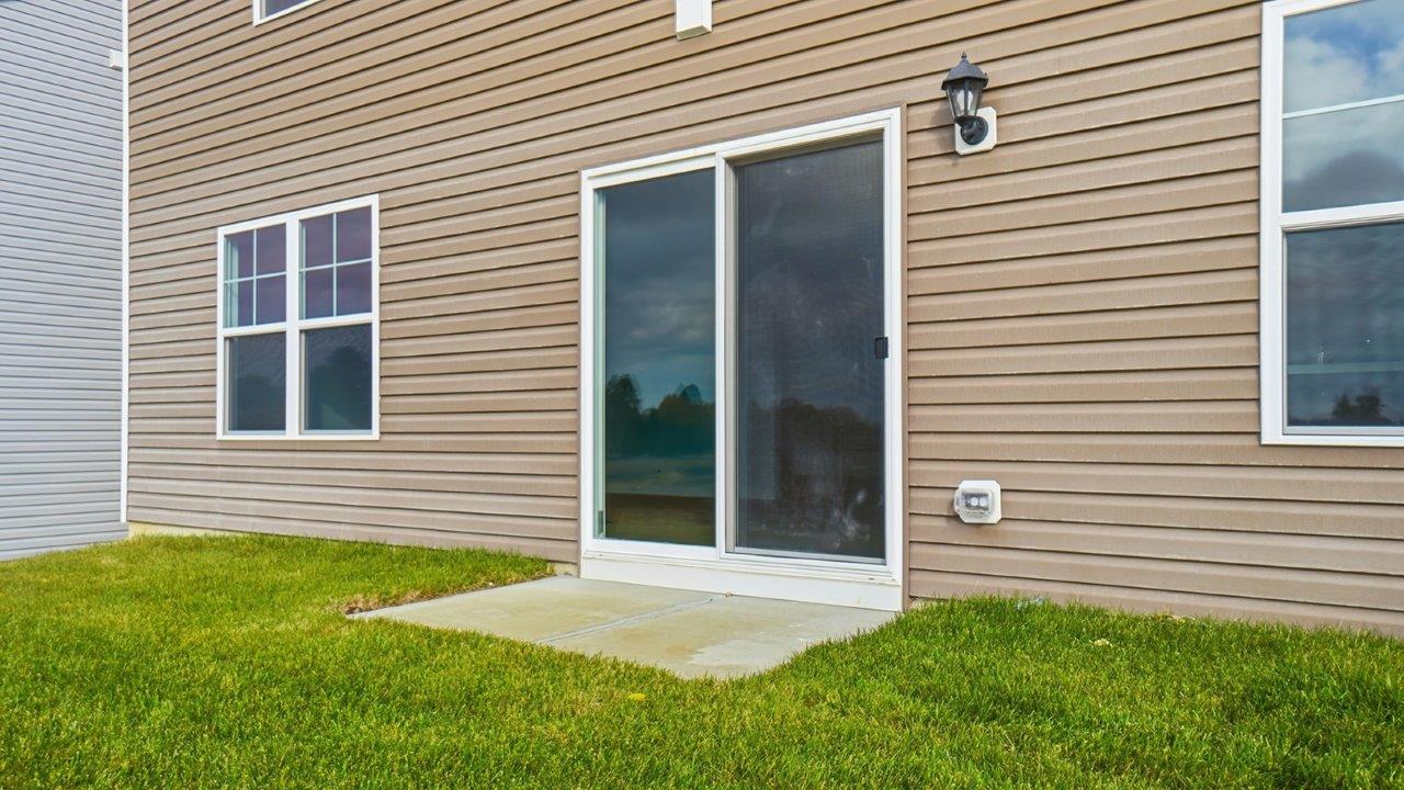 rear sliding door with concrete slab