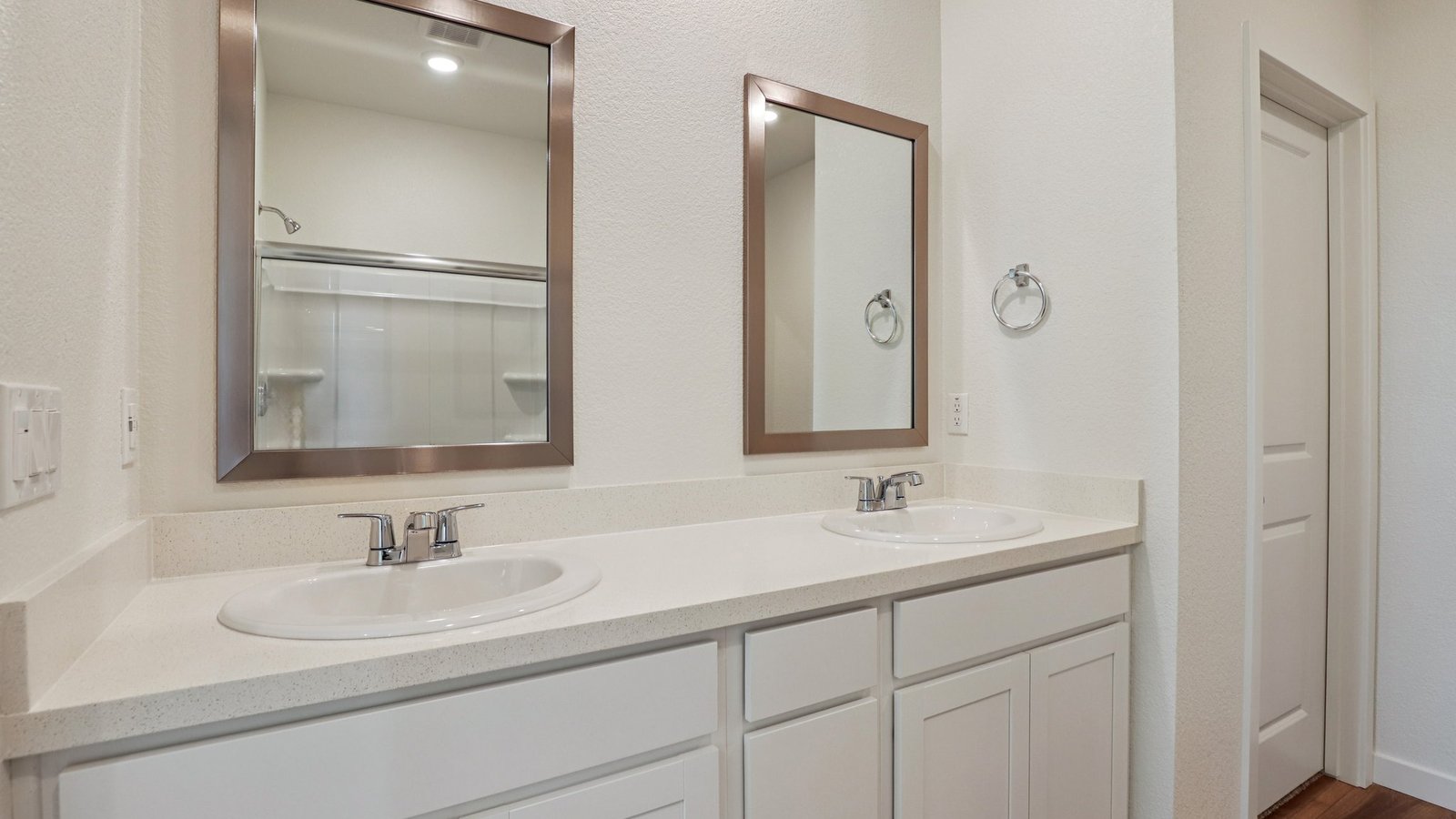 Montego Plan 1924 primary bathroom with double sinks