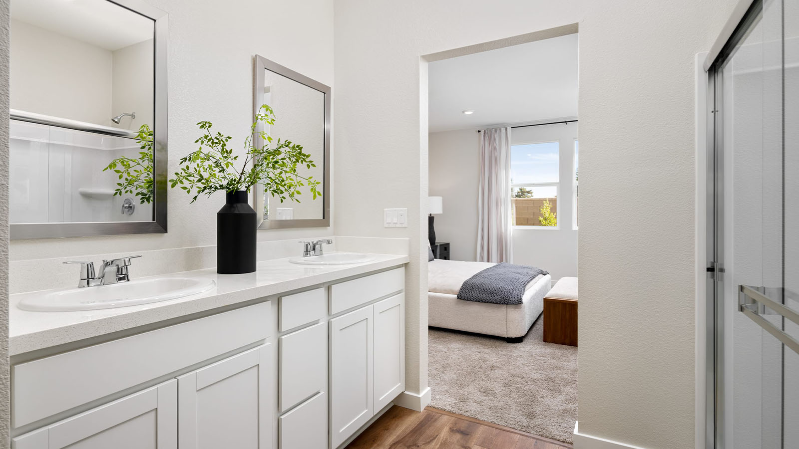 Montego Cali Plan 1924 spa inpired primary bathroom with walk in shower