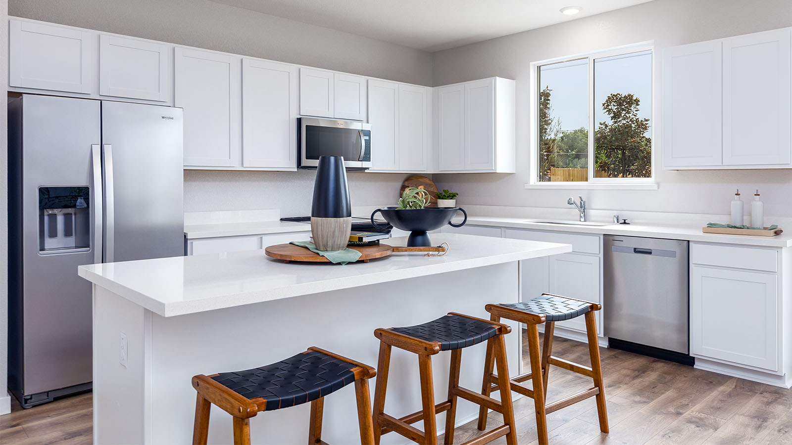 Montego Montara Plan 2311  bright modern kitchen with island and seating