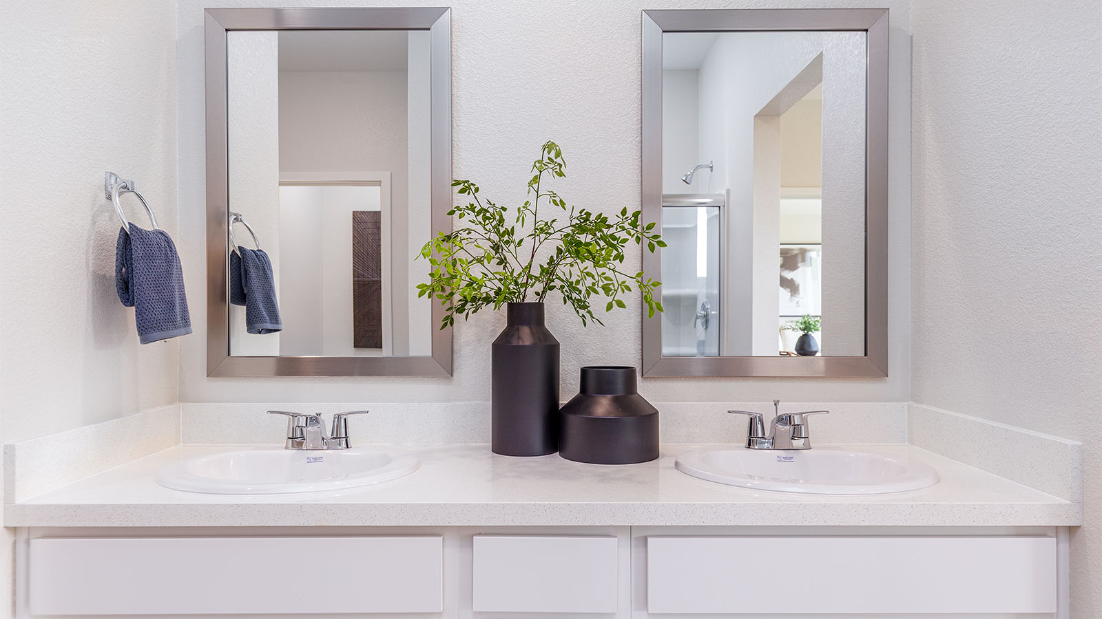 Montego Plan 1924  Spa inspired primary bathroom with double sinks