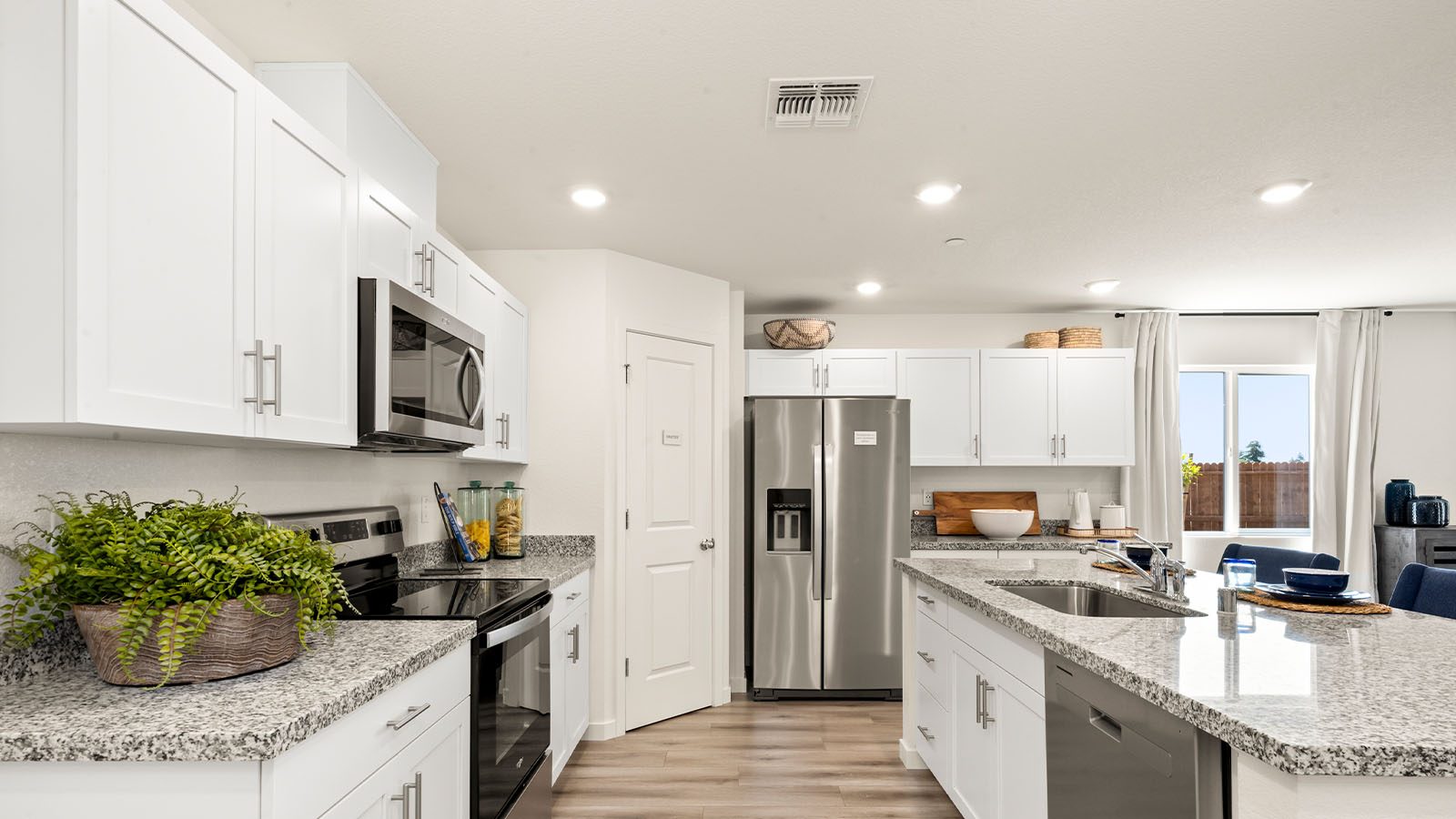 Harter Estates Plan 1825  Bright Modern Kitchen