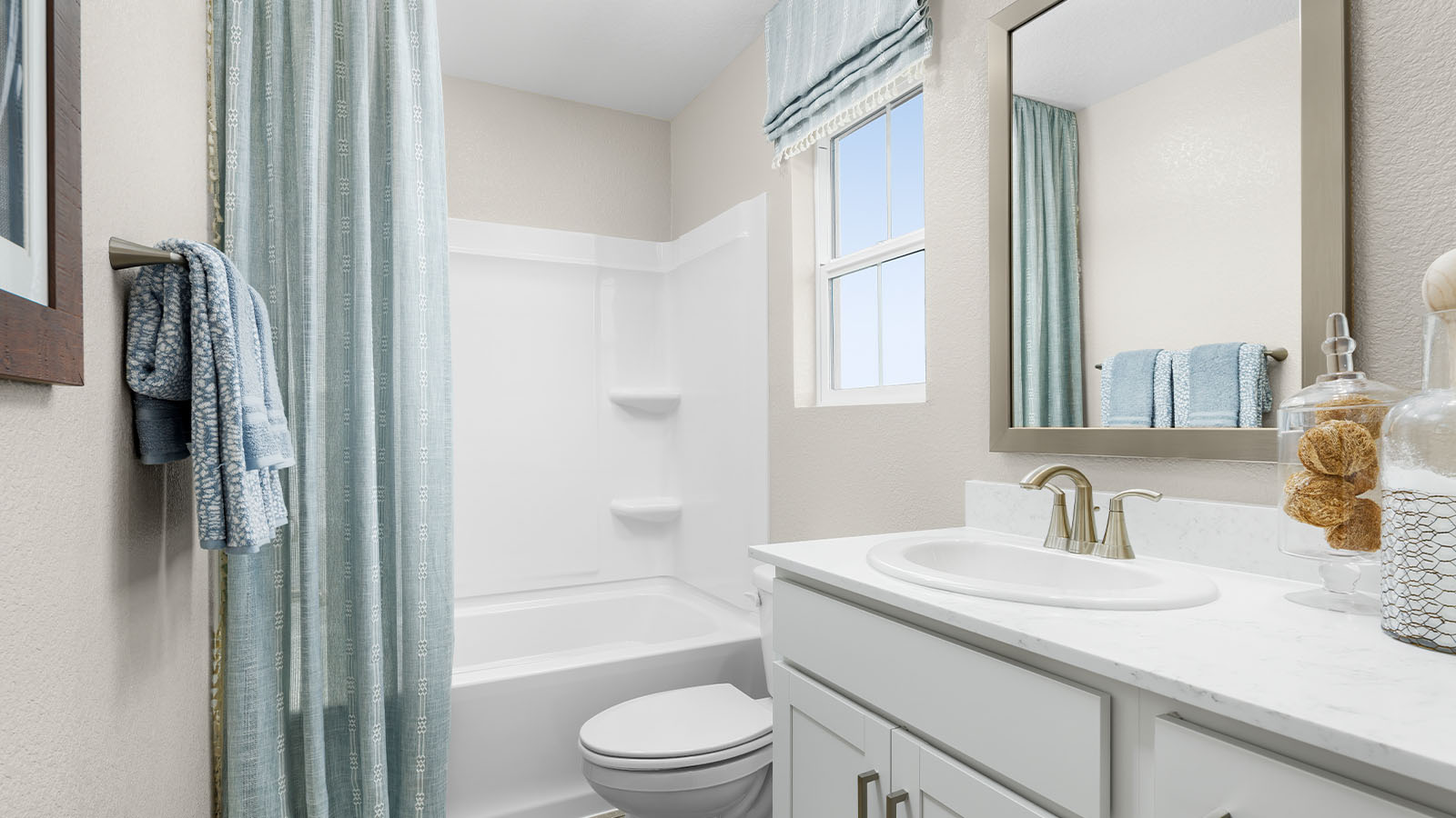 Jasper Plan 1547  secondary full bathroom with dual sinks and bathtub and shower