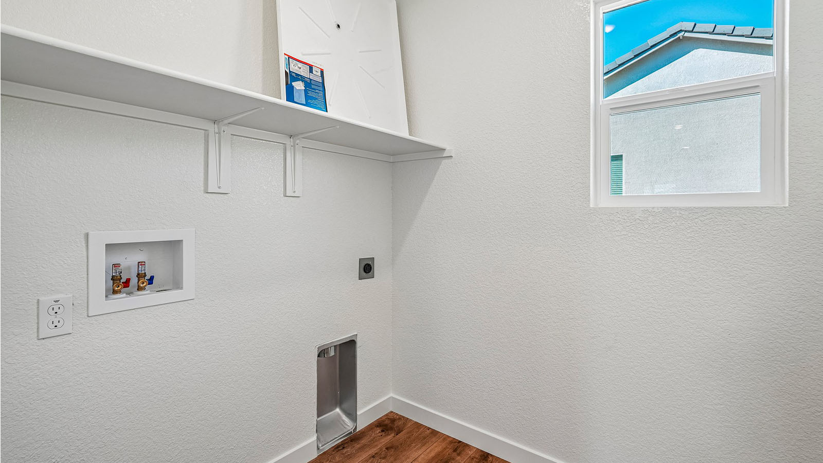 Jasper Clementine Plan 1811 laundry room situated central to the bedrooms