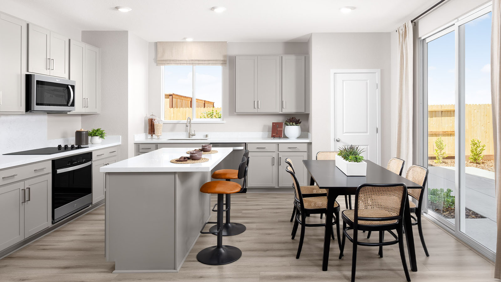 Jasper Clementine Plan 1811 dining area and island with seating