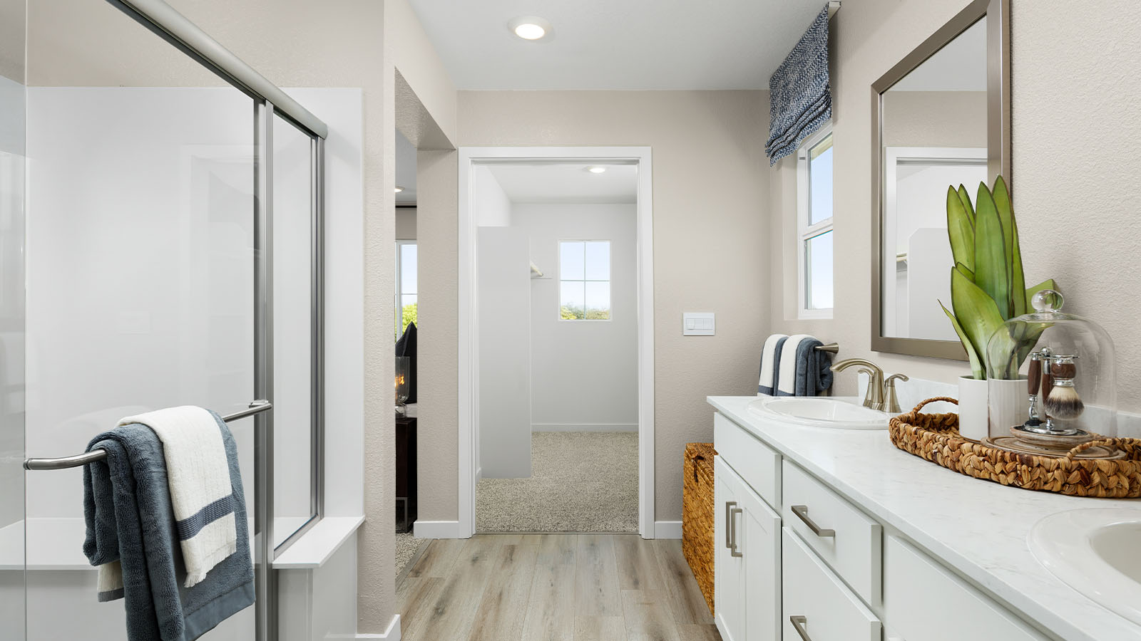 Jasper Muir Plan 1547 primary bathroom with dual sinks and walk in shower