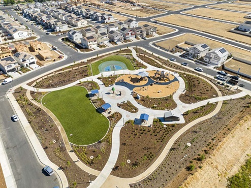 Aerial view of community park and playground