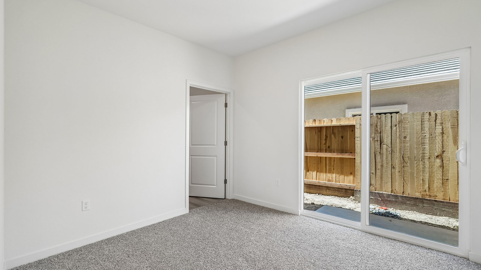 Aviara at Amoruso Ranch Plan 2617 multi gen bedroom with sliding glass door